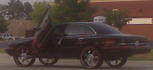 WTF? A Gran Marquis with Lambo doors?